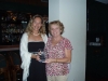 Betsy Langan presents Caroline Sullivan with the 2009 Community Service Award